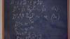 A blackboard filled with formulas